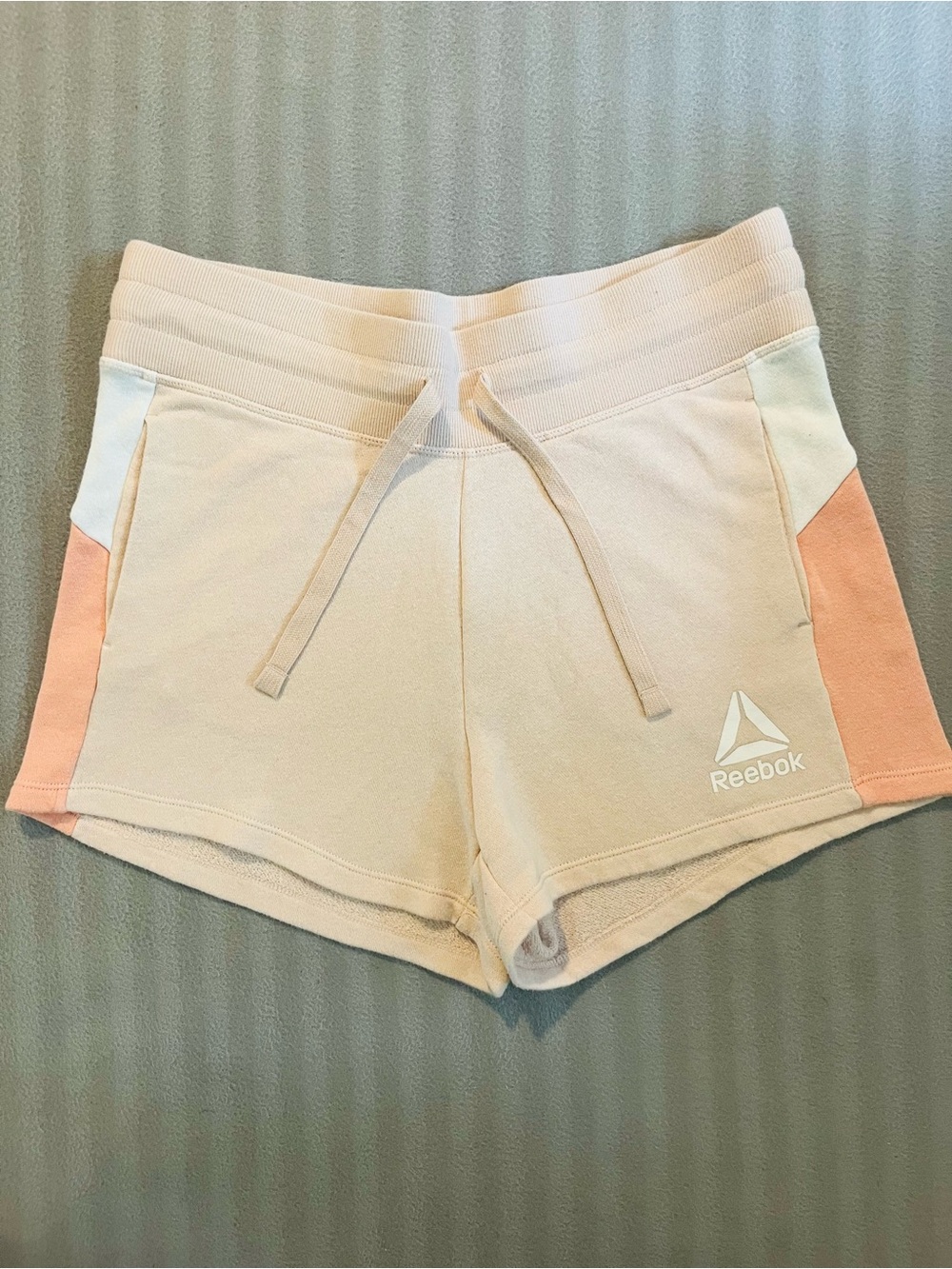 Reebok Women’s Cream and Light Pink Colorblock Athletic Shorts